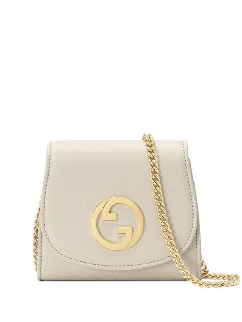 gucci blondie medium chain wallet.